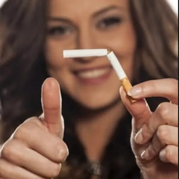 A client breaking a cigarette in half